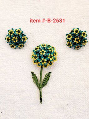 1 Brooch w/matching clip on Earrings, item # B-2631,. wt. 20 grams.